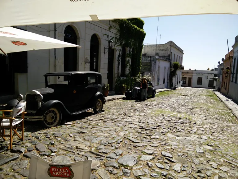 Vintage cars parked around the historic quarter, as familiar as the cobblestone.